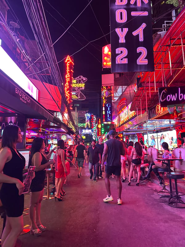 Bangkok red-light district shows typical evening crowd activity