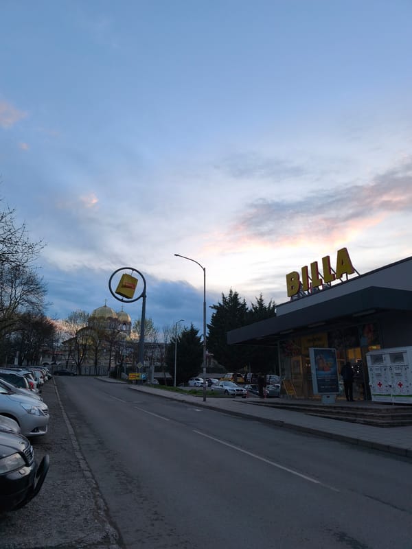 Evening street activity observed near Billa supermarket in Burgas