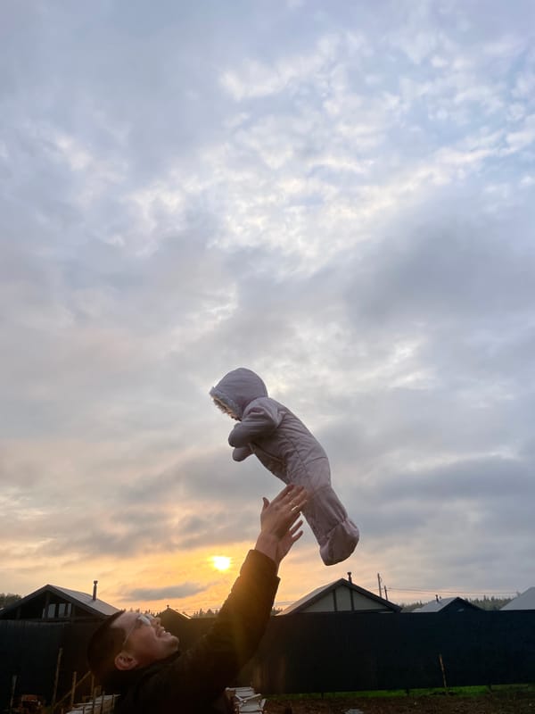 Person tosses baby snowsuit skyward in Russian village