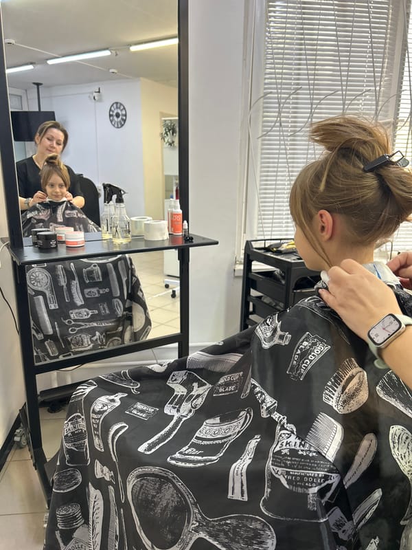 Woman gets haircut and styling at Moscow salon