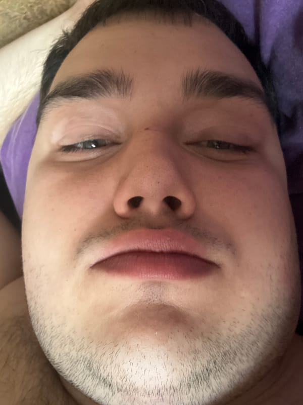 Close-up selfie session from a bedroom, July 2026