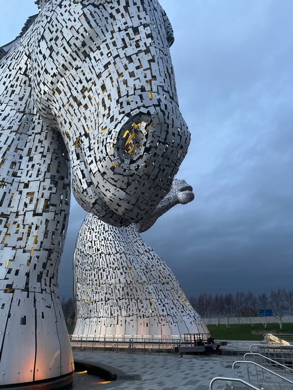 Evening visitors document iconic Kelpies sculptures in Falkirk park