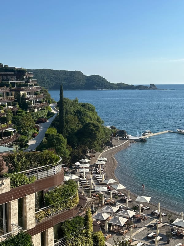 Beach day captured from above in Montenegro resort town