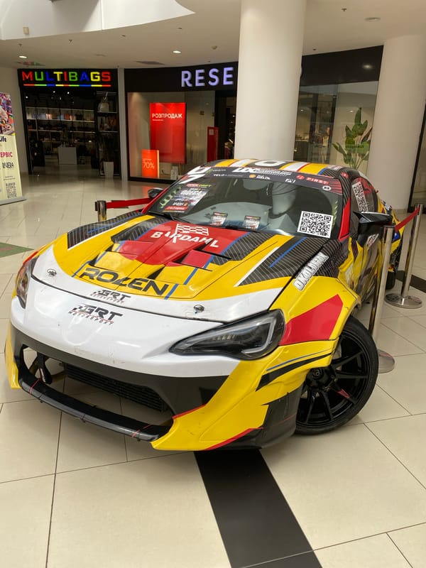 Race car on display inside a shopping mall