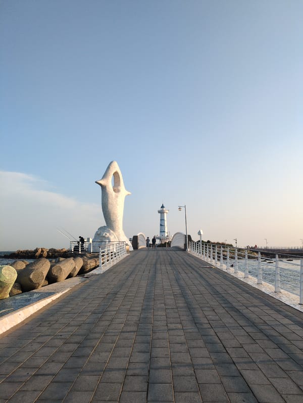 Street musician performs clarinet at Ulsan waterfront