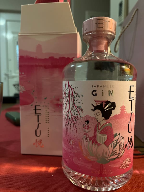 Japanese Gin Bottle Displayed on Red Tablecloth at Golden Beach