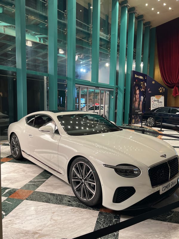 Casino night in Loutraki: Bentleys on the floor, palms lit outside