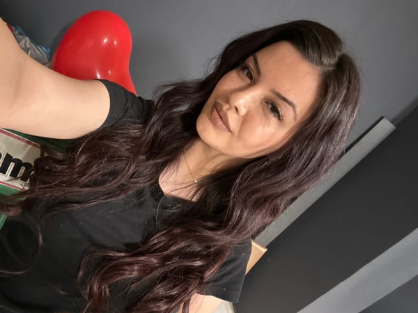 Woman poses with heart balloons in Sliven photo session