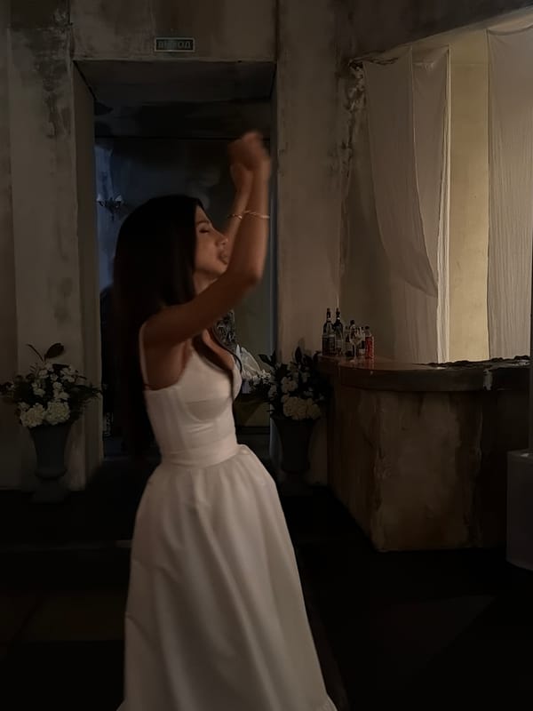 Woman in white dress spotted in concrete room, Bobrovo