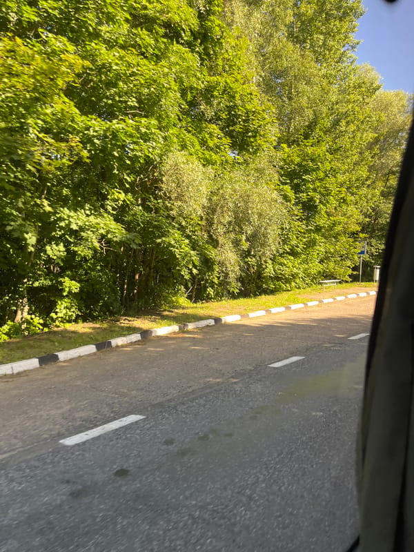 Rural road and open fields in Мядзельскі сельскі Савет, Belarus