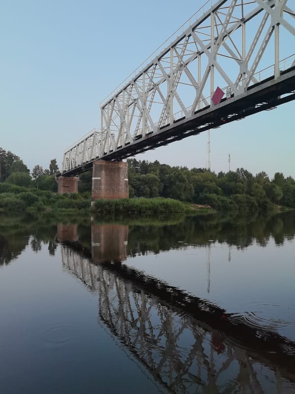 Quiet rivers and bridges in rural Belarus at dusk