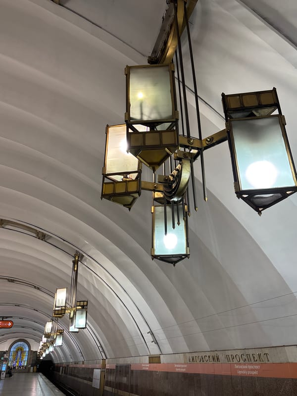 Saint Petersburg Metro Commuters Navigate Ornate Underground Stations