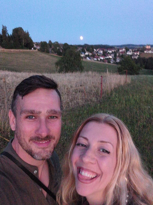 Full moon rising over Black Forest villages at dusk