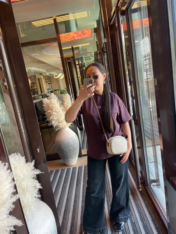 Woman dines at Kokshetau restaurant, documents experience with photos