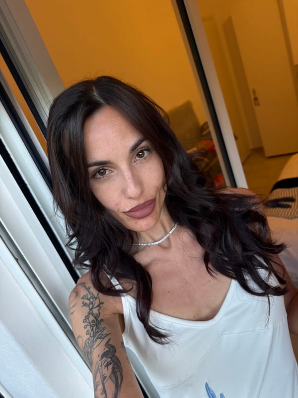 Woman observed near window in Chania interior space