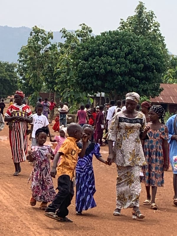 Community gathering documented across multiple locations in Agban, Nigeria