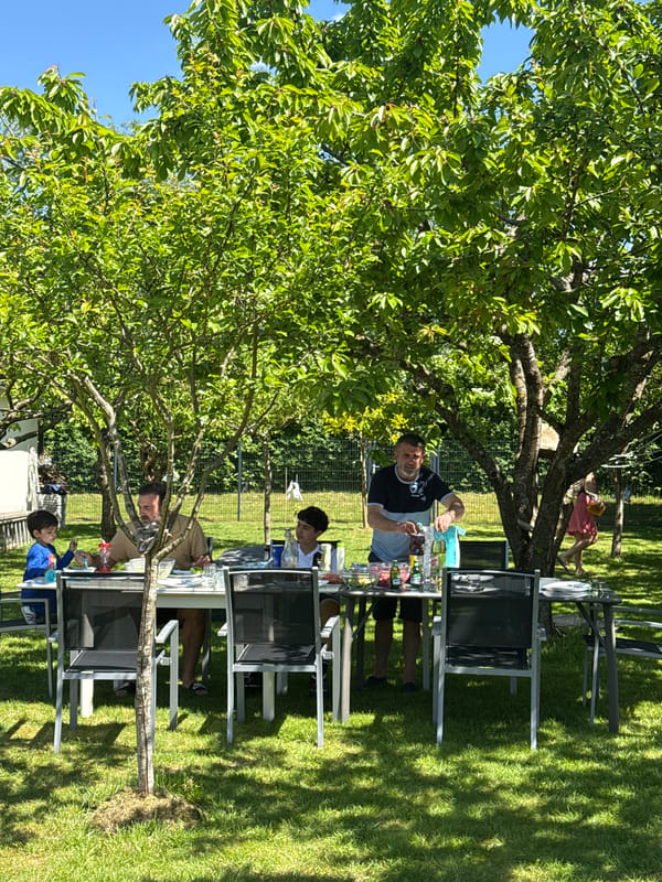 Family backyard barbecue gathering in Junglinster, Luxembourg