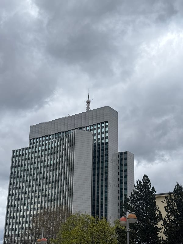 Zagrebtower building photographed under overcast Zagreb sky
