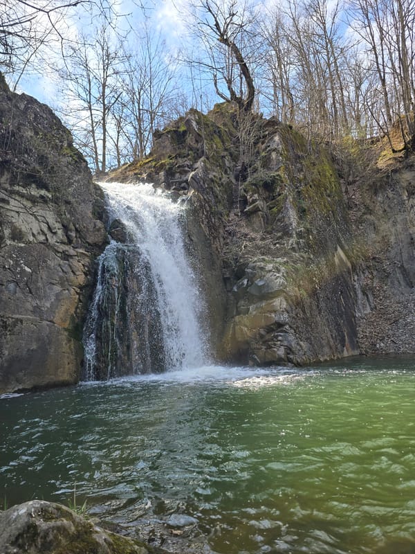 Waterfall documented flowing over rocky cliffs in Kaleytsa, Bulgaria