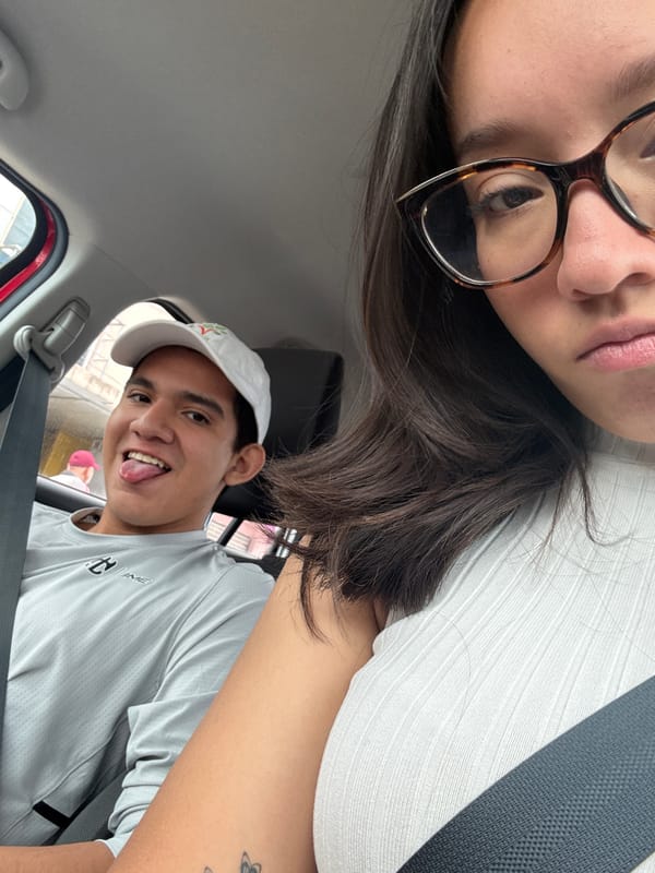 Young couple takes car selfie in Puebla, Mexico