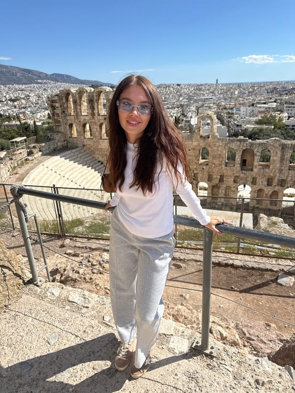 Tourists visit ancient Odeon theater on Athens Acropolis