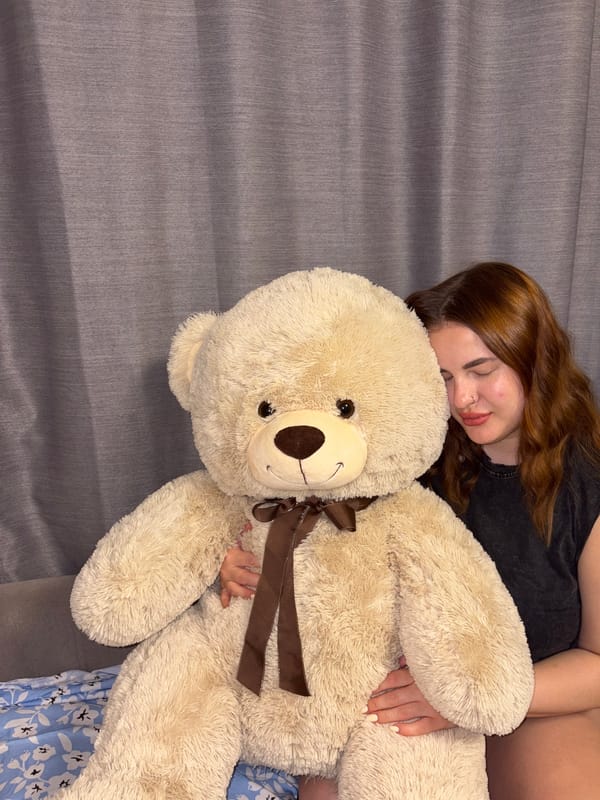 Young woman photographed resting with teddy bear in Krasnodar