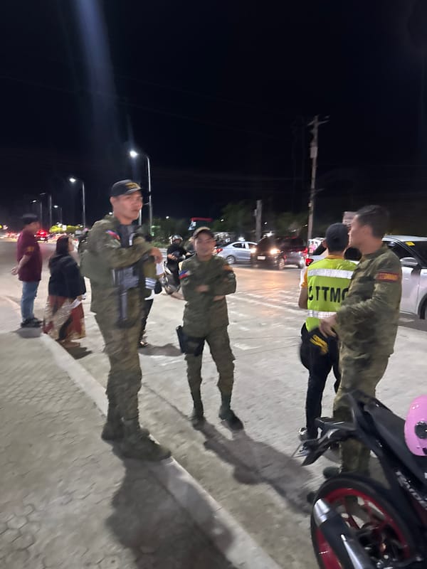 Davao night festival: street food, live stage, and military vehicles