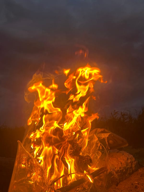 Courtyard fire and badminton on a summer night in Kaspiysk
