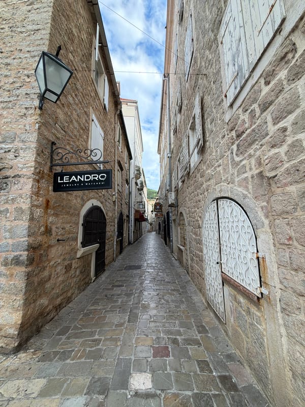 Tourist documents stone streets and architecture in Budva Montenegro