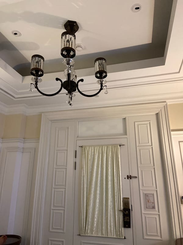 Exploring a traditionally decorated hotel room in Central Jakarta