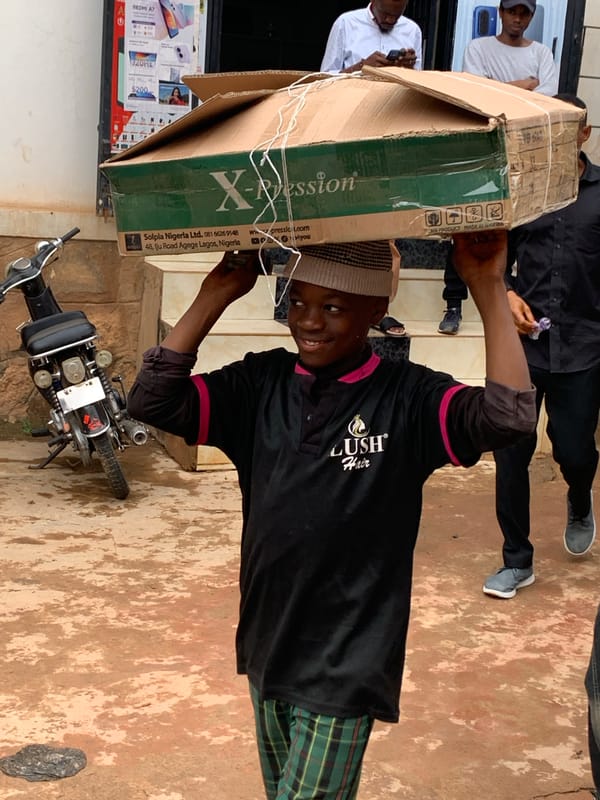 Daily life unfolds on Jos streets during midday hours