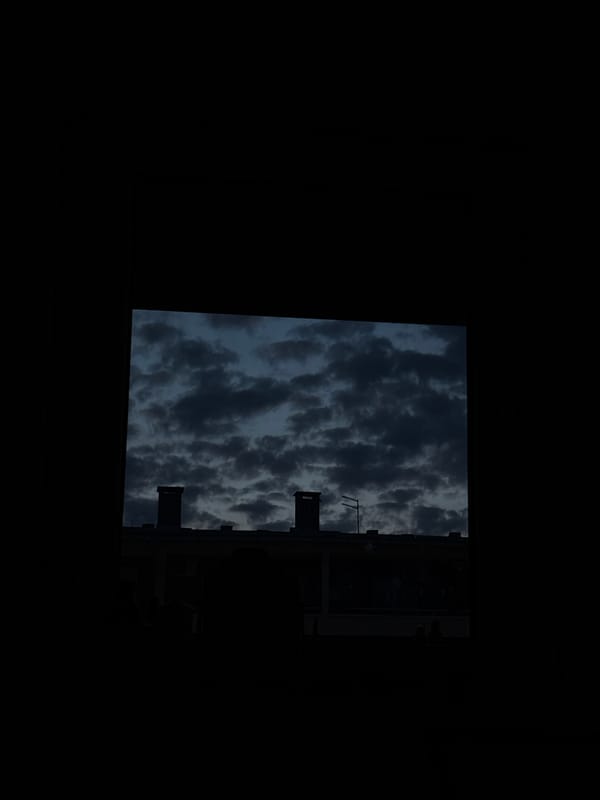 Dense dark clouds observed over Kragujevac, Serbia buildings