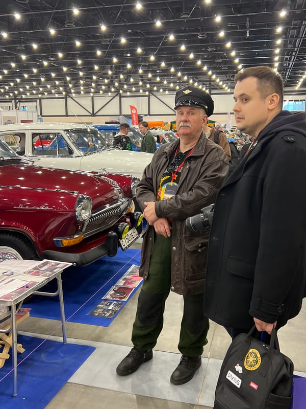 Indoor car show features exposed chassis displays in Shushary