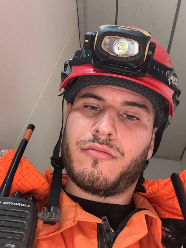 Worker in safety gear takes selfie in Brest
