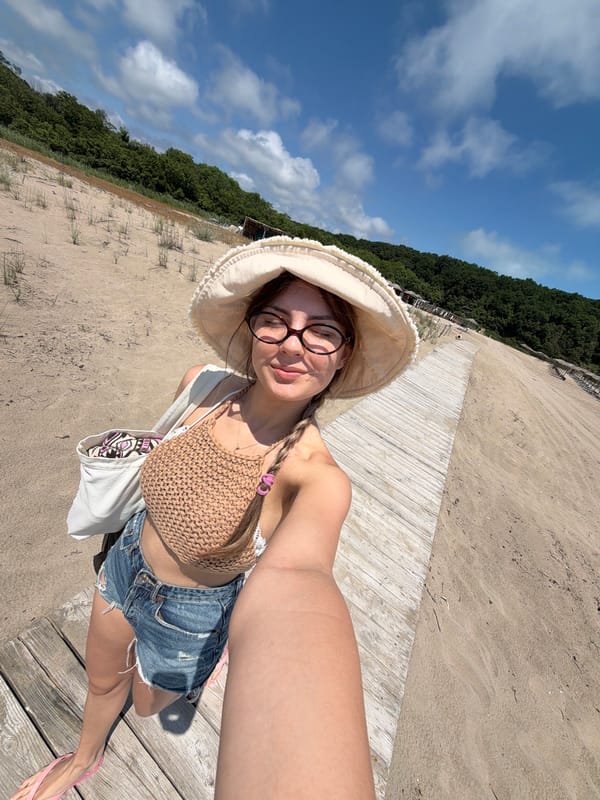 Woman takes selfie on Rezovo beach, Bulgaria