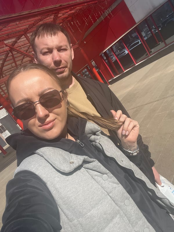 Woman takes selfies outside Izhevsk State Circus