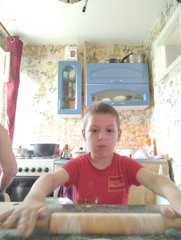 Rolling dough in a Kingisepp kitchen
