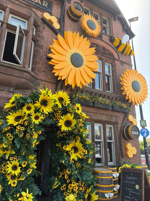 Social gathering documented at bee-themed Salford pub