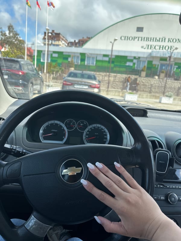 Woman photographed driving Chevrolet in Sochi, Russia