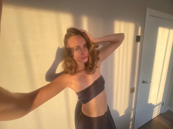 Golden hour selfie session in a Russian apartment