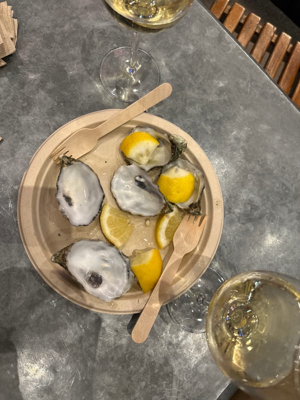 Madrid diner enjoys oysters with lemon at local establishment