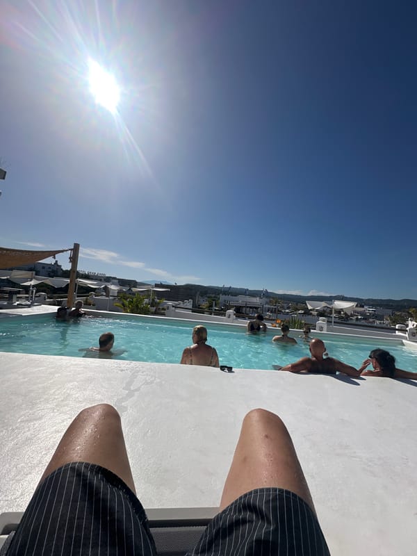 Poolside downtime at a Lloret de Mar resort on a sunny afternoon