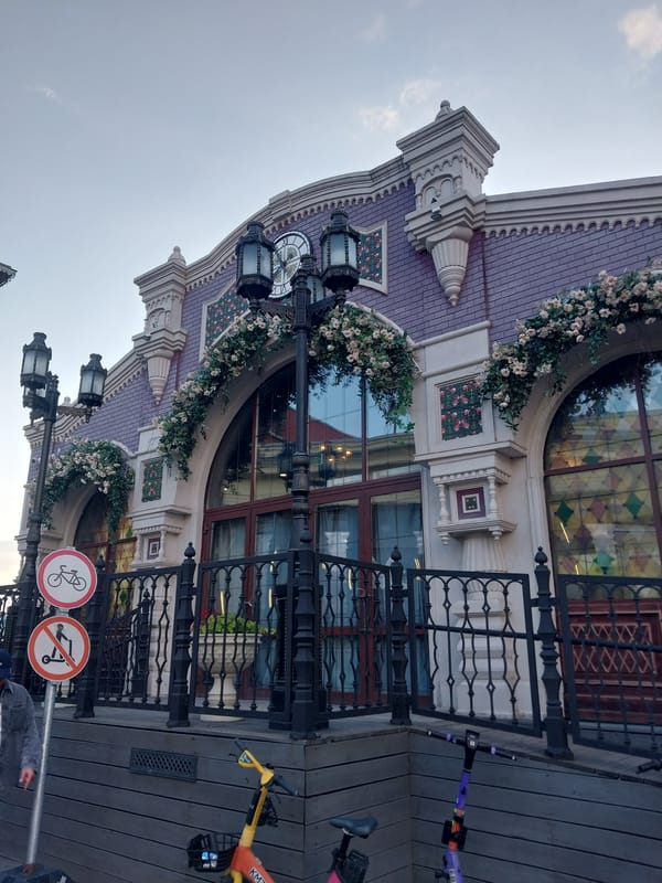 Moscow afternoon: Red Square architecture, a carousel, and an aquarium diver