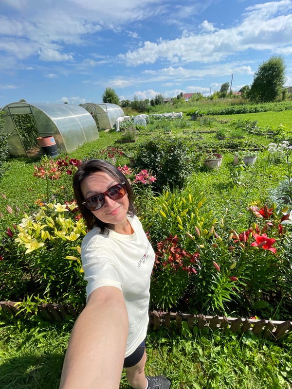 Summer lily garden in rural Russia, selfies and blooms