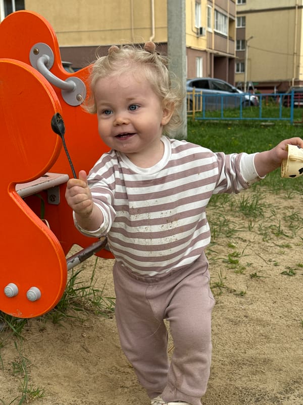Toddler plays on playground equipment in Vladimir, Russia