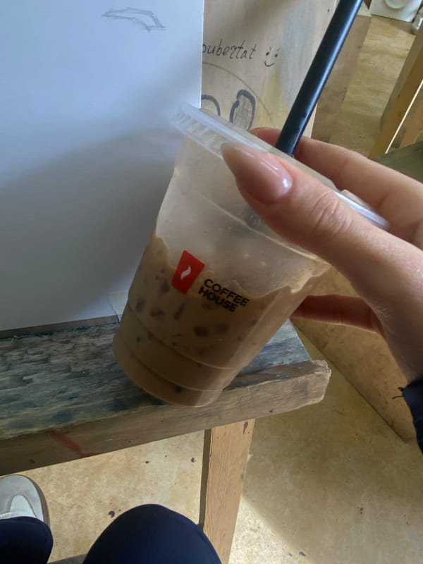Artist draws still life while enjoying iced coffee in Yerevan