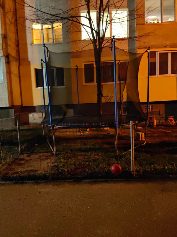 Nighttime trampoline setup documented in Sofia courtyard