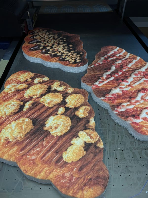 Industrial facility produces decorative cut-outs including snowflakes, food shapes