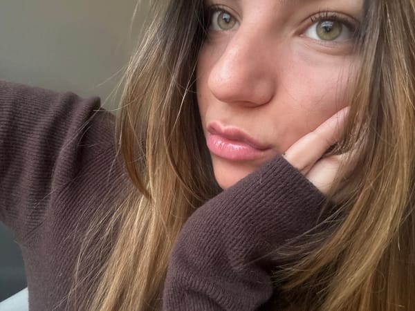 Person with highlighted hair spotted with designer sunglasses case