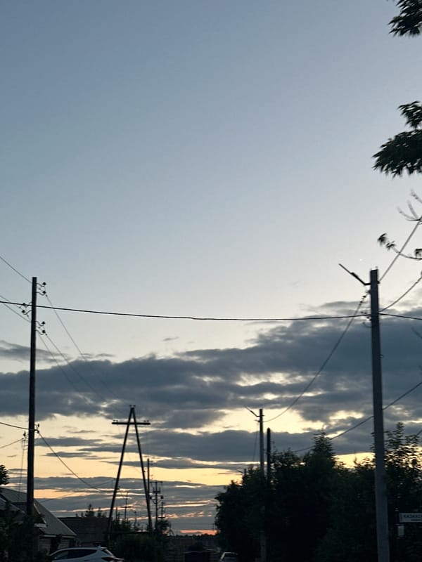 Tobyl at dusk: streets, skies, cats, and quiet hours